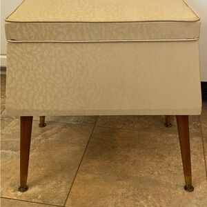 Mid-Century Style CreamUpholstered Ottoman/Sewing Storage